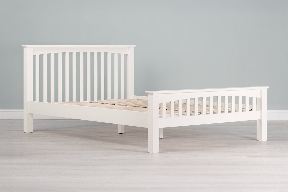 Side profile of the Boston Soft White 4ft6 Double bed frame without mattress.