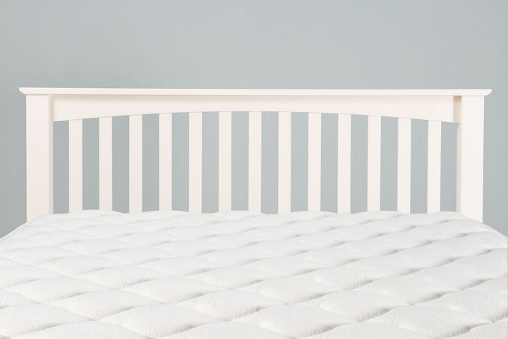 Slatted headboard of the Boston Soft White 5ft King Size bed frame shown with mattress.