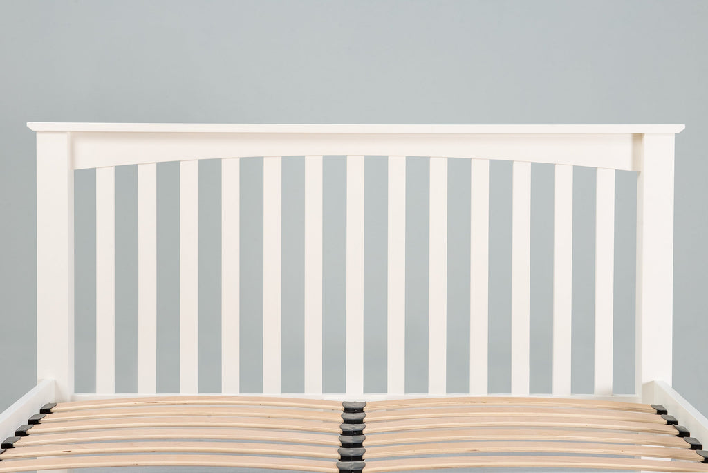 Close-up of the slatted headboard on the Boston Soft White 6ft Super King Size bed frame.