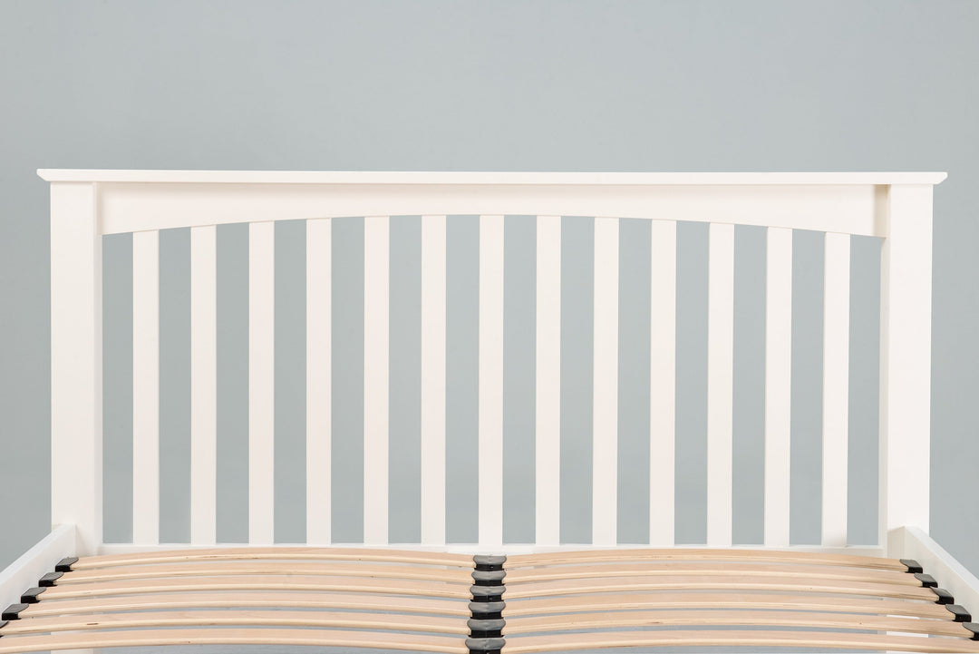 Close-up of the slatted headboard on the Boston Soft White 6ft Super King Size bed frame.