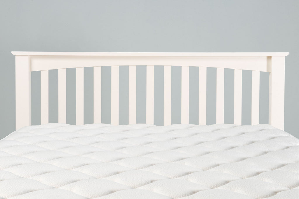 Slatted headboard of the Boston Soft White 6ft Super King Size bed frame shown with mattress.