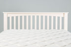 Slatted headboard of the Boston Soft White 6ft Super King Size bed frame shown with mattress.