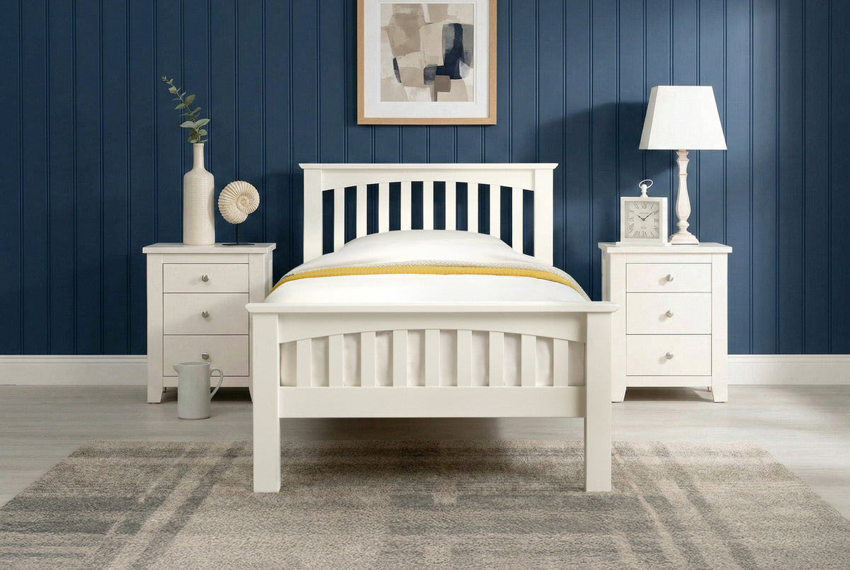 Boston Soft White Solid Wood 3ft Single Bed Frame front view with white bedding and mustard throw, styled without pillow