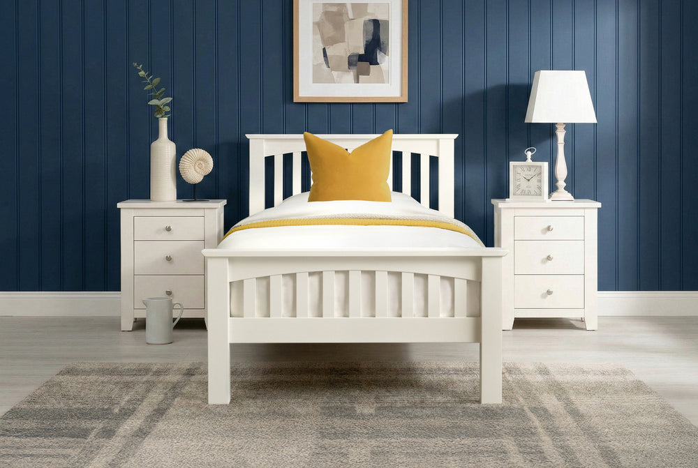 Boston Soft White Solid Wood 3ft Single Bed Frame front view with white bedding and yellow accent pillow