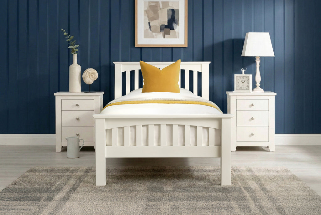 Boston Soft White Solid Wood 3ft Single Bed Frame front view with white bedding and yellow accent pillow