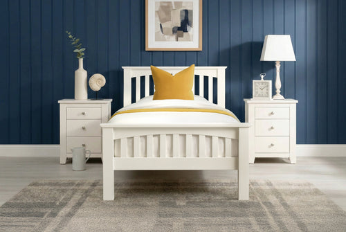 Boston Soft White Solid Wood 3ft Single Bed Frame front view with white bedding and yellow accent pillow