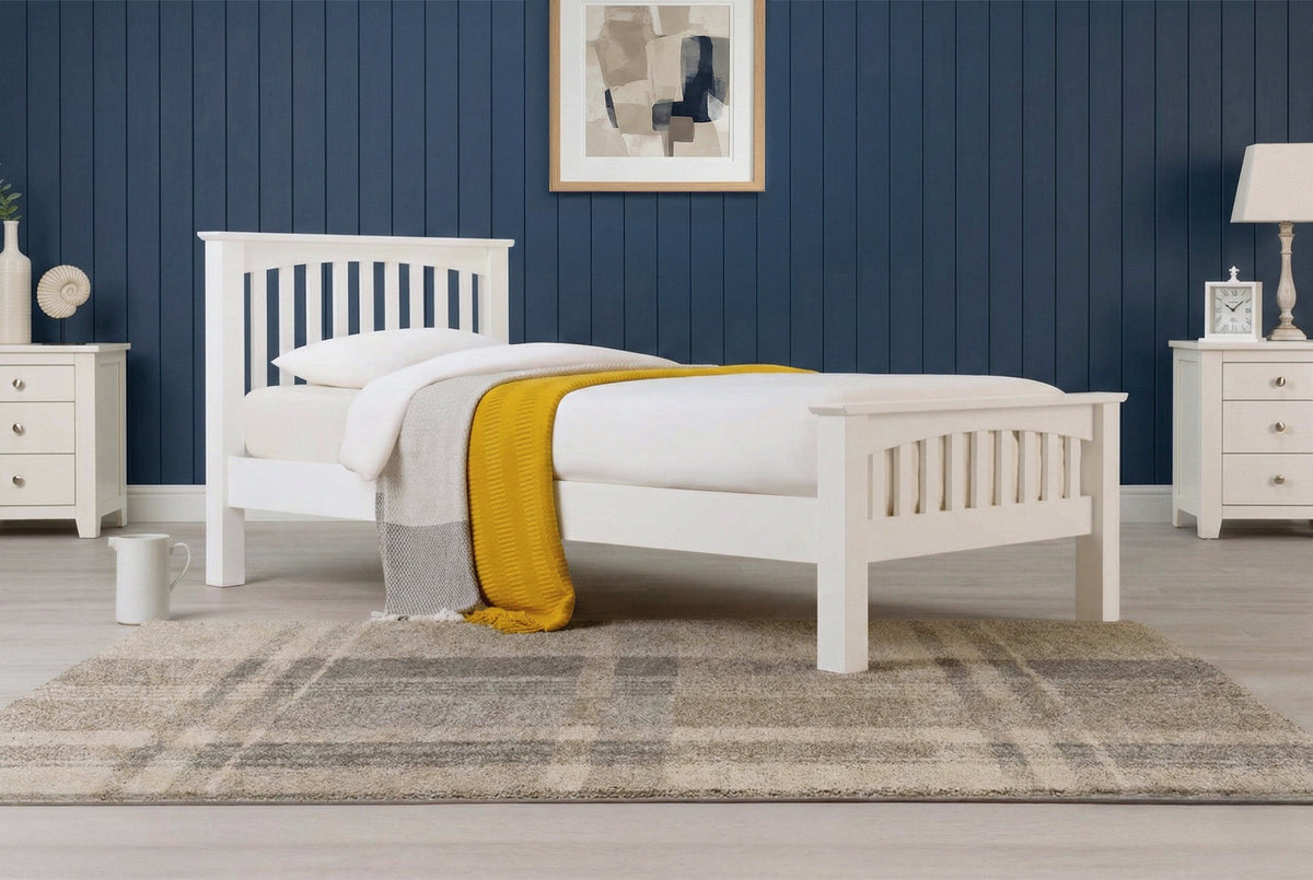 Boston Soft White Solid Wood 3ft Single Bed Frame side view with white bedding and mustard throw, styled without pillow