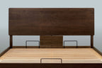 Mayfair solid walnut double ottoman bed headboard and slatted base without a mattress, showing the mattress retainer bars