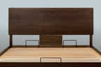 Mayfair solid walnut king size ottoman bed headboard and slatted base without a mattress, showing the mattress retainer bars