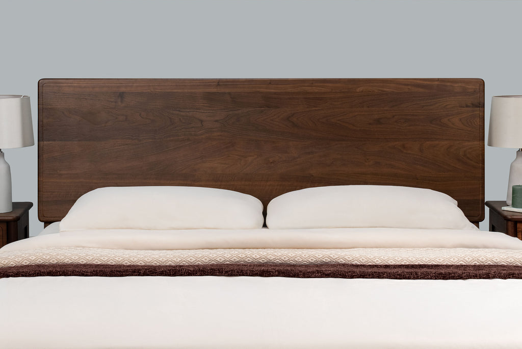 Mayfair solid walnut super king bed headboard, front close-up with two white pillows and no scatter cushions
