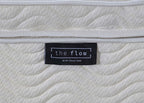 The Flow Drift Cloud 2000 mattress brand label close up on quilted fabric side panel