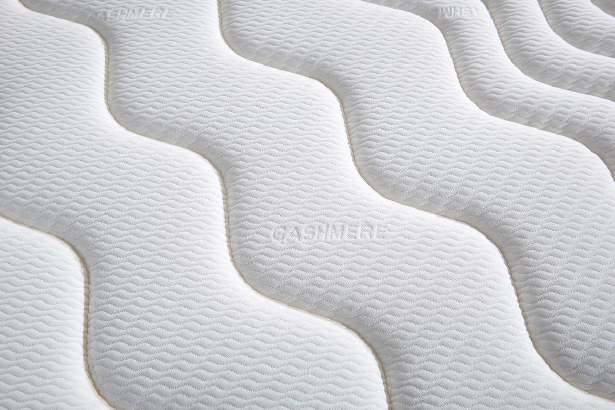Close up of The Flow Drift Cloud 2000 mattress cashmere feel cover with soft textured quilting