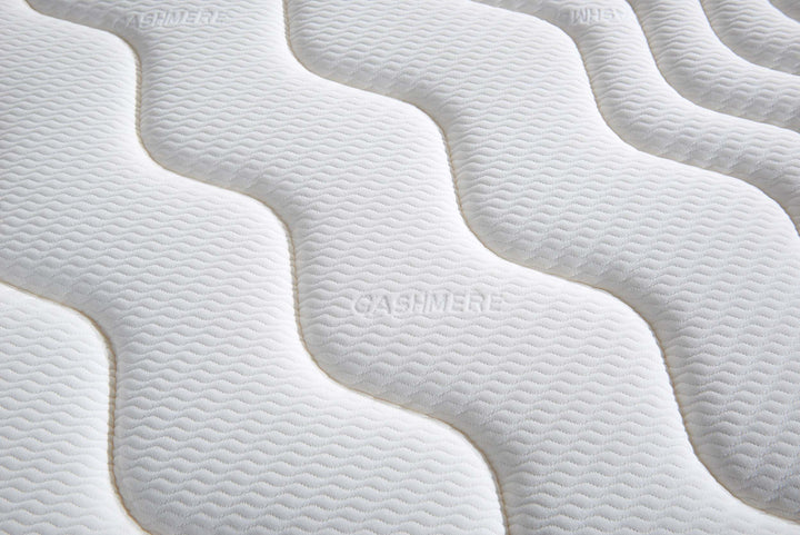 Close up of The Flow Drift Cloud 2000 mattress cashmere feel cover with soft textured quilting
