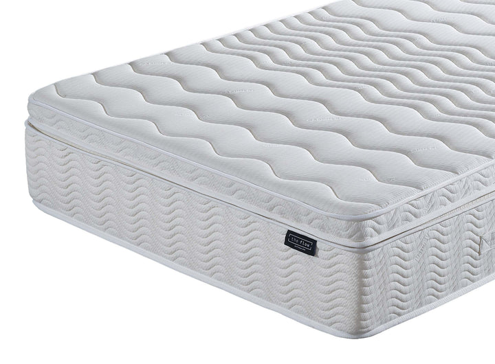 Close up of The Flow Drift Cloud 2000 mattress top corner showing quilted box top detail