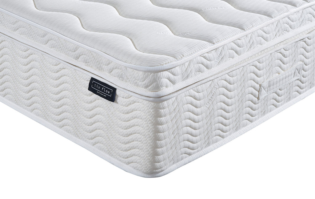 The Flow Drift Cloud 2000 mattress side panel with stitched detailing and brand label