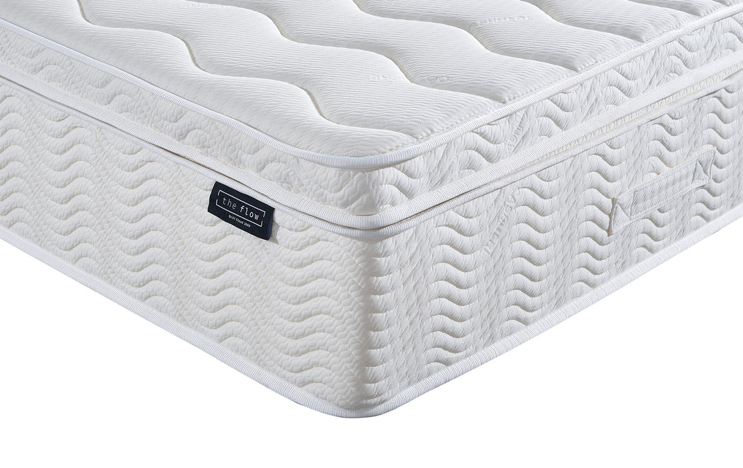 The Flow Drift Cloud 2000 mattress side panel with stitched detailing and brand label