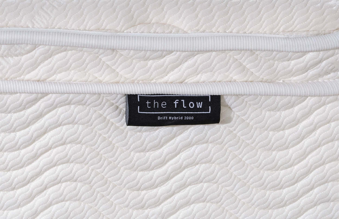The Flow Drift Hybrid 2000 mattress brand label close up 