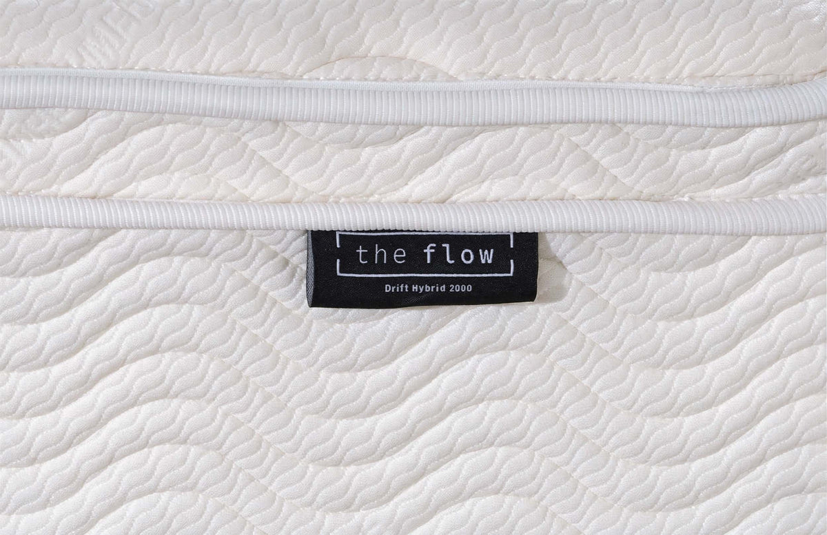 The Flow Drift Hybrid 2000 mattress brand label close up 