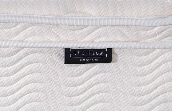 The Flow Drift Hybrid 2000 mattress brand label close up 