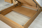 Wilmore solid natural oak king size ottoman bed storage area with one removable plywood base panel in place