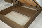 Wilmore solid rustic oak super king ottoman bed storage area with one removable plywood base panel in place